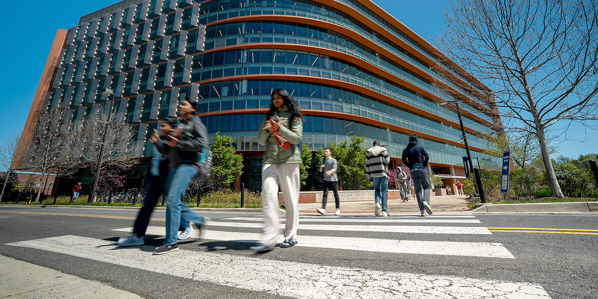 Multiple students crossing the street in front of the Iribe Center. Credit: Mark Sherwood