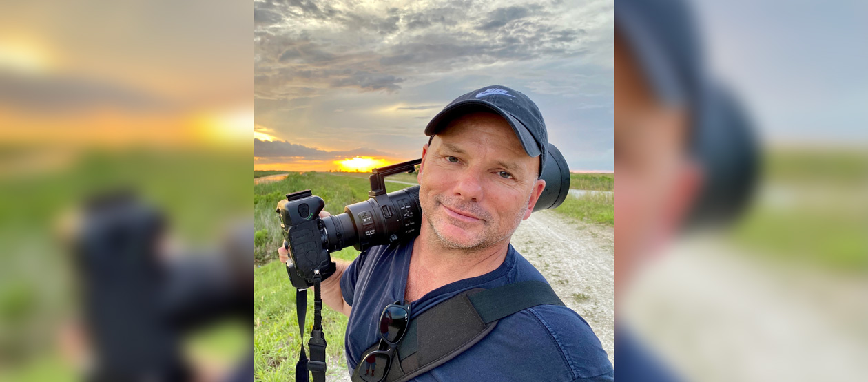 Michael Patrick O’Neill carrying his camera as he works in a natural setting Michael Patrick O’Neill carrying his camera as he works in a natural setting