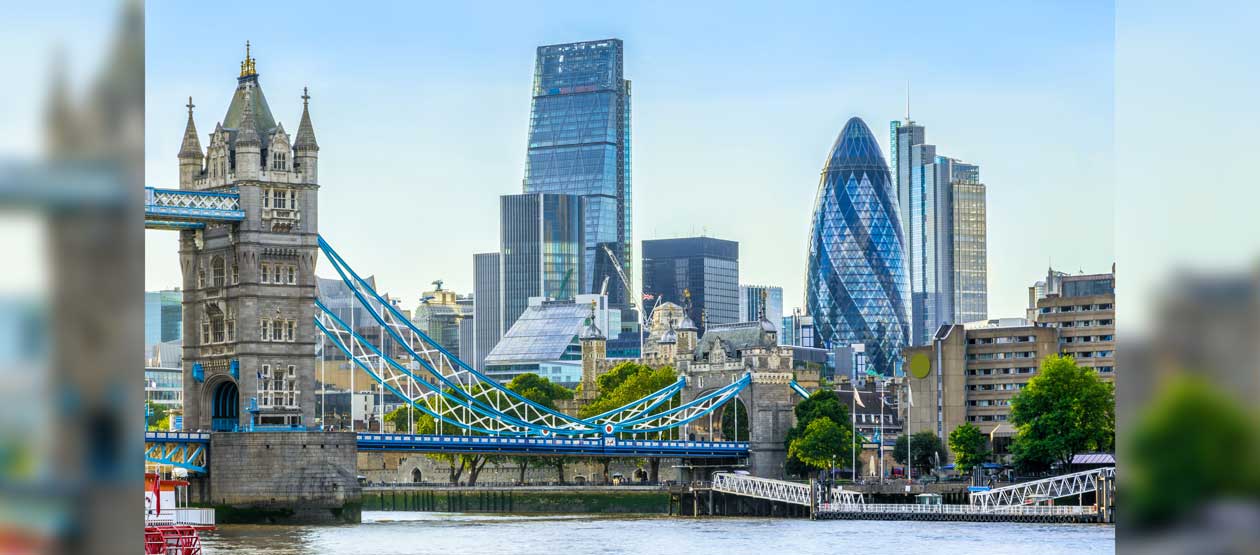 London skyline with the London Bridge and the River Thames in the foreground London skyline with the London Bridge and the River Thames in the foreground