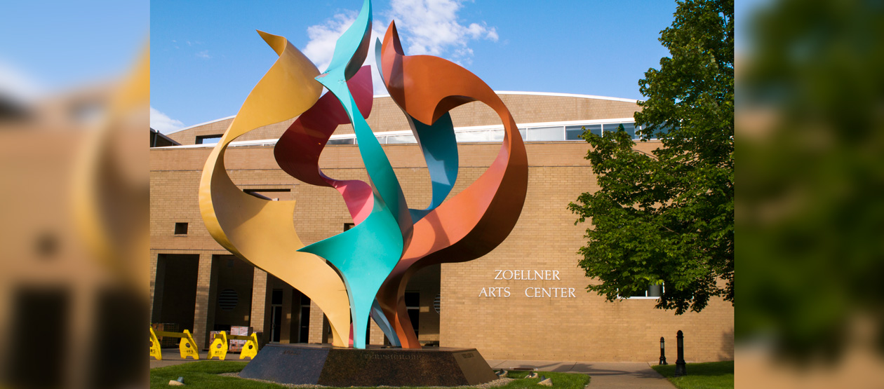 exterior of Zoellner Arts Center with a colorful art sculpture in the foreground